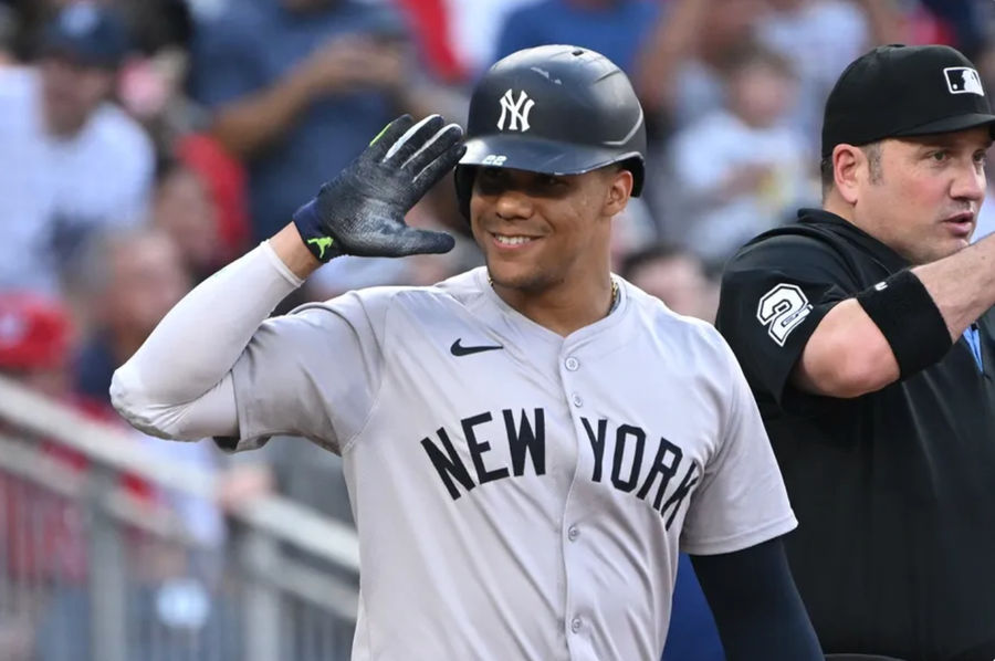 Aug 26, 2024; Washington, District of Columbia, USA; New York Yankees right fielder Juan Soto (22) salutes the Washington Nationals bench before an at bat during the first inning at Nationals Park. Mandatory Credit: Rafael Suanes-USA TODAY Sports