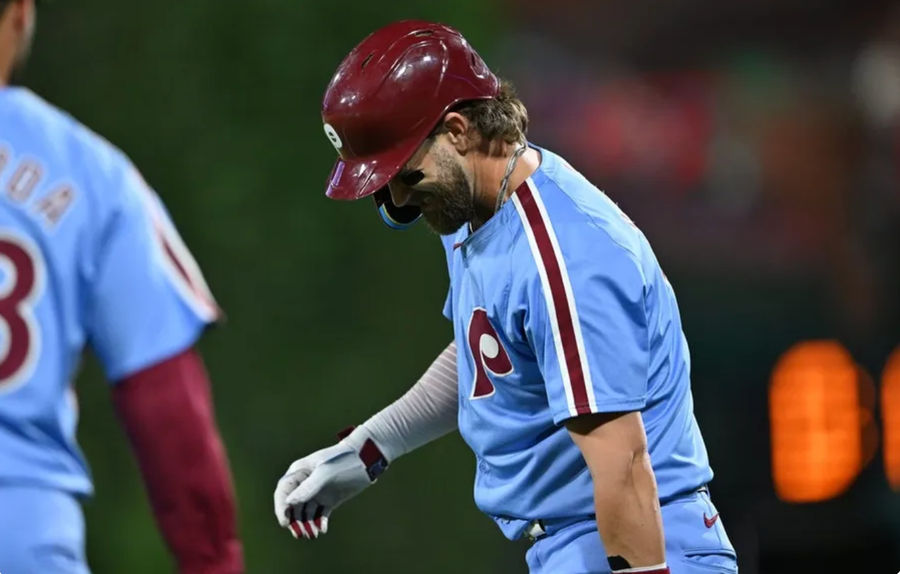 Jun 27, 2024; Philadelphia, Pennsylvania, USA; Philadelphia Phillies first baseman Bryce Harper (3) reacts after running to first against the Miami Marlins in the ninth inning at Citizens Bank Park. Mandatory Credit: Kyle Ross-USA TODAY Sports