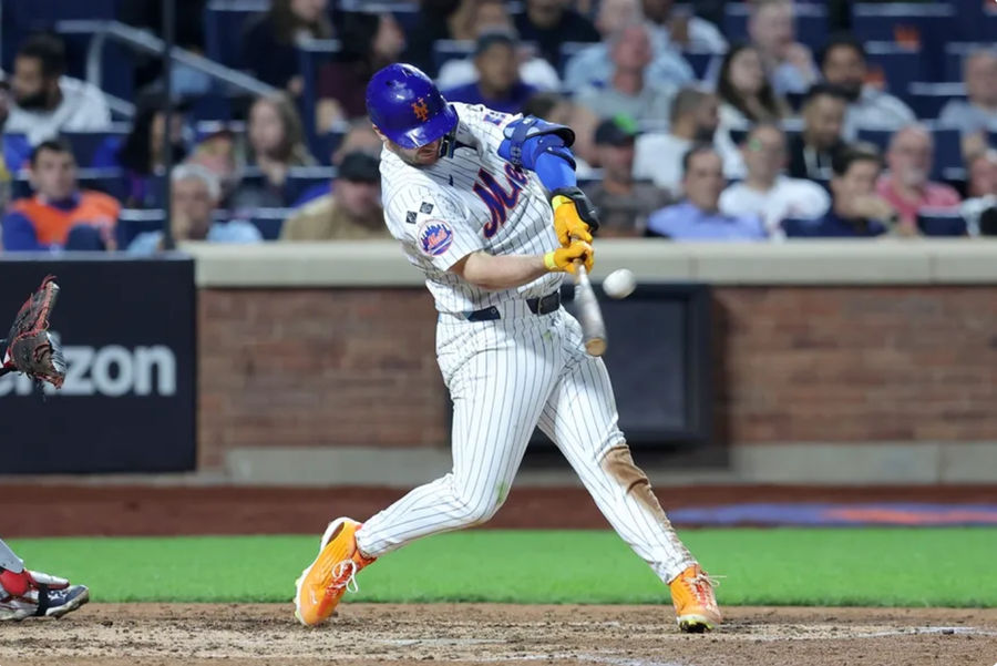 Sep 17, 2024; New York City, New York, USA; New York Mets first baseman Pete Alonso (20) hits a three-run home run against the Washington Nationals during the sixth inning at Citi Field. Mandatory Credit: Brad Penner-Imagn Images