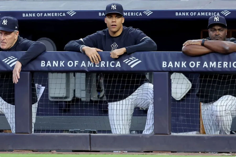 Jun 7, 2024; Bronx, New York, USA; New York Yankees right fielder Juan Soto (22) watches from the bench during the third inning against the Los Angeles Dodgers at Yankee Stadium. Mandatory Credit: Brad Penner-USA TODAY Sports