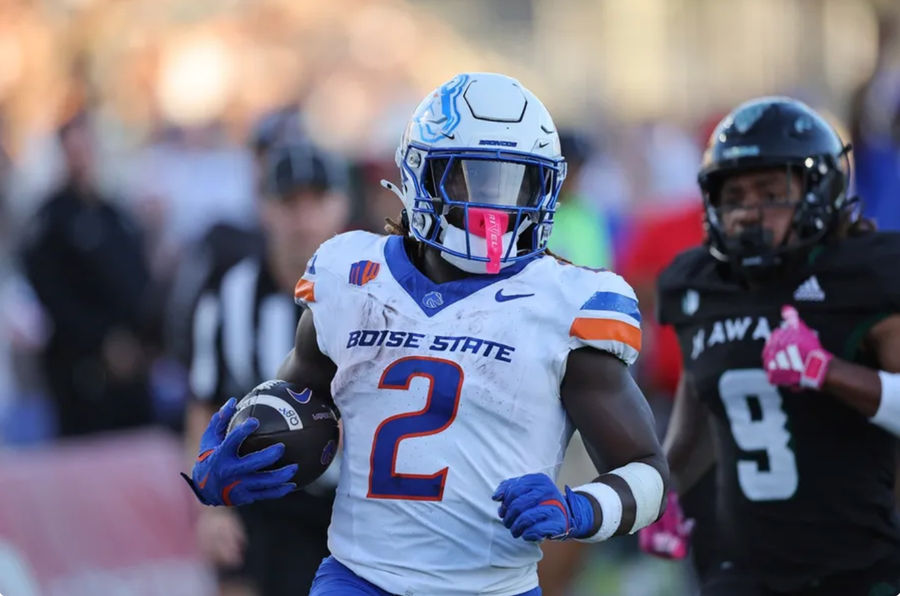 Oct 12, 2024; Honolulu, Hawaii, USA; Boise State Broncos running back Ashton Jeanty (2) runs the ball in for a touchdown during the first quarter an NCAA college football game against the Hawaii Rainbow Warriors at Clarence T.C. Ching Athletics Complex. Mandatory Credit: Marco Garcia-Imagn Images