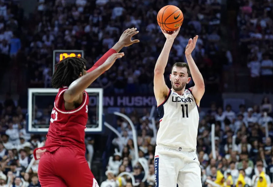 Nov 6, 2024; Storrs, Connecticut, USA; Connecticut Huskies forward Alex Karaban (11) shoots against the Sacred Heart Pioneers in the second half at Harry A. Gampel Pavilion. Mandatory Credit: David Butler II-Imagn Images