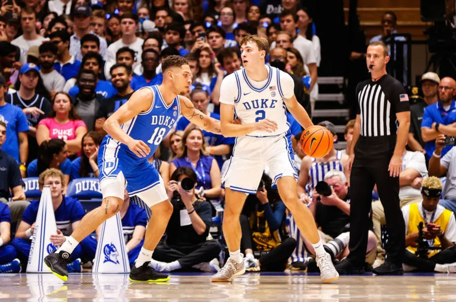 Oct 4, 2024; Durham, NC, USA; Duke Blue Devils guard Cooper Flagg (2) dribbles the ball against forward Mason Gillis (18) with the ball during Countdown to Craziness at Cameron Indoor Stadium. Mandatory Credit: Jaylynn Nash-Imagn Images