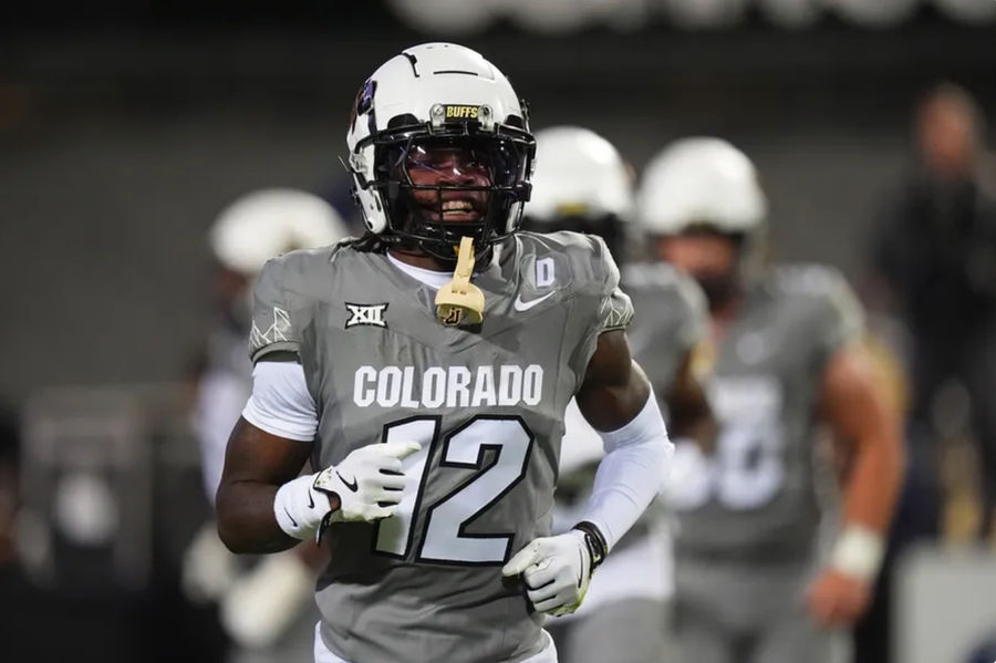 Oct 26, 2024; Boulder, Colorado, USA; Colorado Buffaloes wide receiver Travis Hunter (12) reacts after touchdown reception in the first quarter against the Cincinnati Bearcats at Folsom Field. Mandatory Credit: Ron Chenoy-Imagn Images