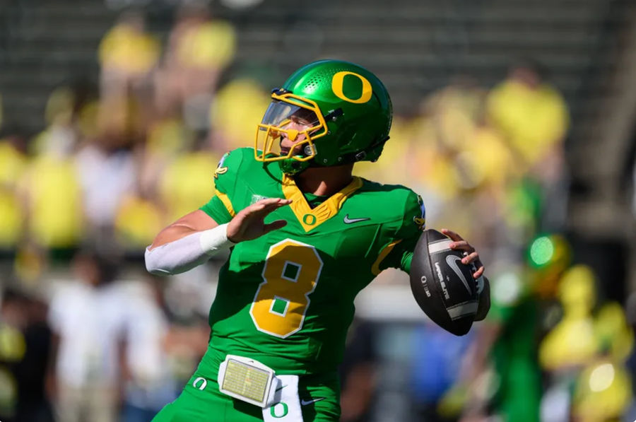 Aug 31, 2024; Eugene, Oregon, USA; Oregon Ducks quarterback Dillon Gabriel (8) throws a pass warming up before the game against the Idaho Vandals at Autzen Stadium. Mandatory Credit: Craig Strobeck-Imagn Images