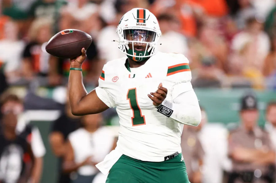 Sep 21, 2024; Tampa, Florida, USA; Miami Hurricanes quarterback Cam Ward (1) drops back to pass against the South Florida Bulls in the second quarter at Raymond James Stadium. Mandatory Credit: Nathan Ray Seebeck-Imagn Images