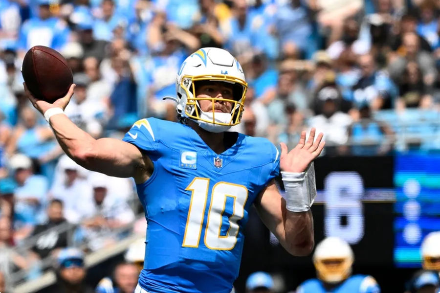 Sep 15, 2024; Charlotte, North Carolina, USA; Los Angeles Chargers quarterback Justin Herbert (10) looks to pass in the second quarter at Bank of America Stadium. Mandatory Credit: Bob Donnan-Imagn Images