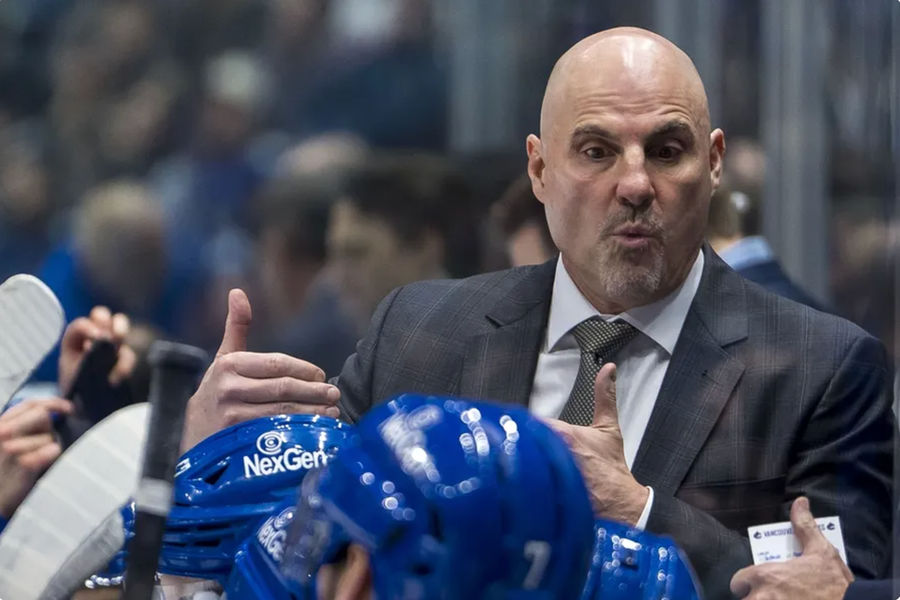 Nov 19, 2024; Vancouver, British Columbia, CAN; Vancouver Canucks head coach Rick Tocchet on the bench against the New York Rangers during the third period at Rogers Arena. Mandatory Credit: Bob Frid-Imagn Images