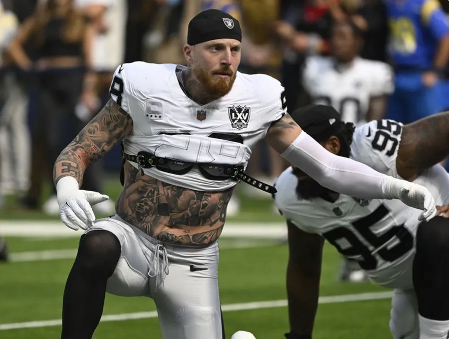 Oct 20, 2024; Inglewood, California, USA; Las Vegas Raiders defensive end Maxx Crosby (98) stretches during pregame warmups before an NFL game against the Los Angeles Rams at SoFi Stadium. Mandatory Credit: Robert Hanashiro-Imagn Images