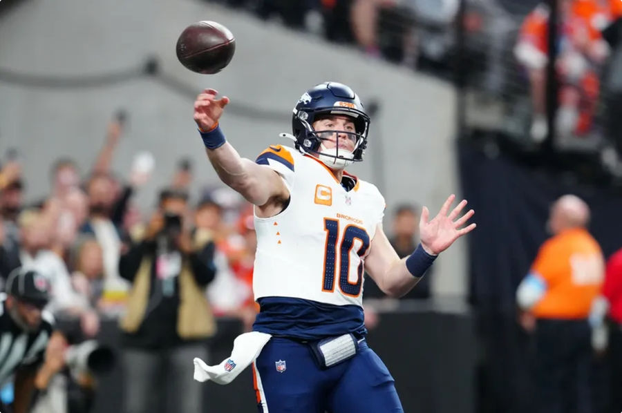 Nov 24, 2024; Paradise, Nevada, USA; Denver Broncos quarterback Bo Nix (10) makes a pass against the Las Vegas Raiders during the third quarter at Allegiant Stadium. Mandatory Credit: Stephen R. Sylvanie-Imagn Images