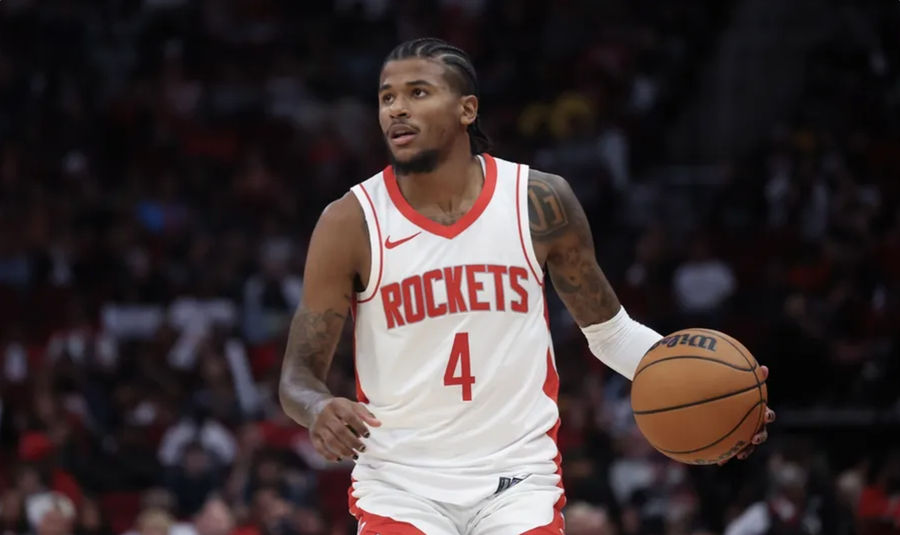 Oct 17, 2024; Houston, Texas, USA; Houston Rockets guard Jalen Green (4) dribbles against the San Antonio Spurs in the fourth quarter at Toyota Center. Mandatory Credit: Thomas Shea-Imagn Images