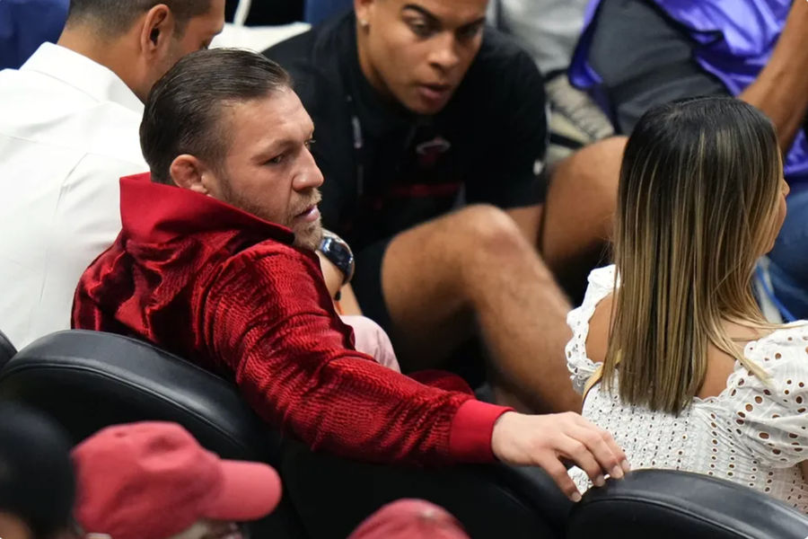 Jun 9, 2023; Miami, Florida, USA; Irish mixed martial artist Conor McGregor looks on during the first half in game four of the 2023 NBA Finals between the Miami Heat and the Denver Nuggets at Kaseya Center. Mandatory Credit: Rich Storry-Imagn Images