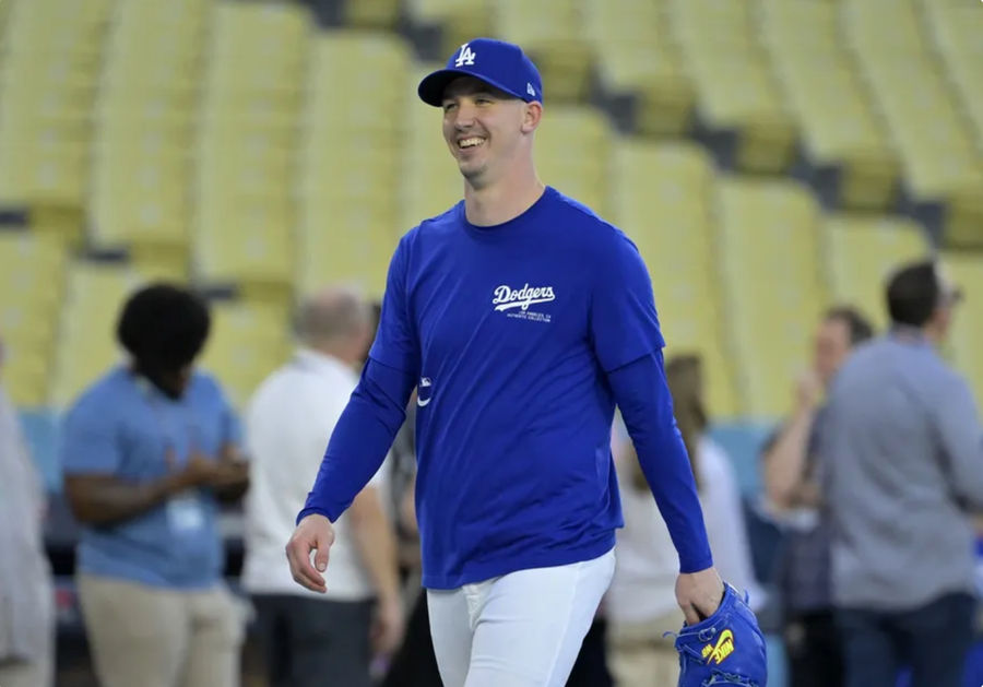 Oct 24, 2024; Los Angeles, CA, USA; Los Angeles Dodgers starting pitcher Walker Buehler (21) during the team workout prior to game one of the World Series against the New York Yankees at Dodger Stadium. Mandatory Credit: Jayne Kamin-Oncea-Imagn Images