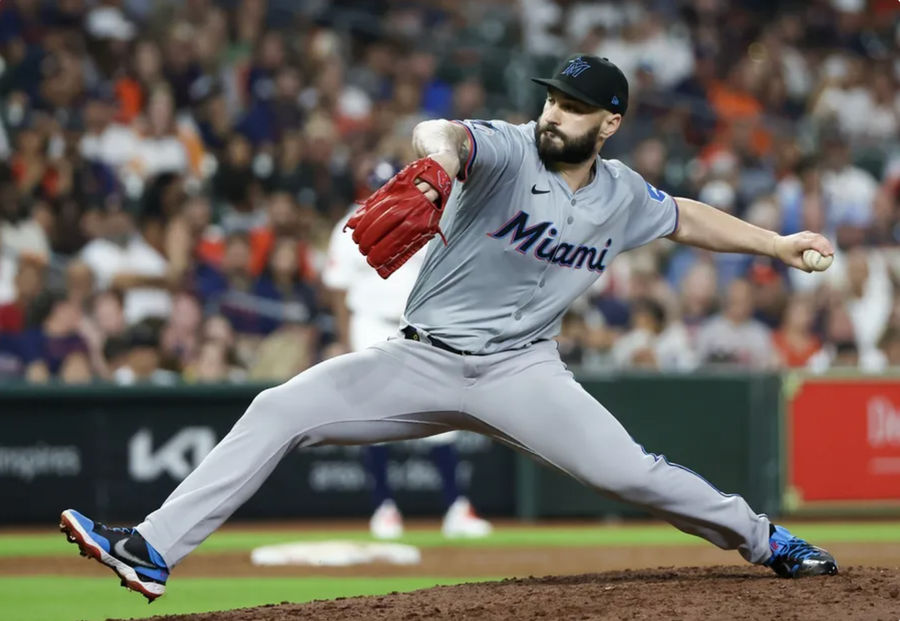 Jul 11, 2024; Houston, Texas, USA; Miami Marlins relief pitcher Tanner Scott (66) pitches against the Houston Astros in the eighth inning at Minute Maid Park. Mandatory Credit: Thomas Shea-USA TODAY Sports