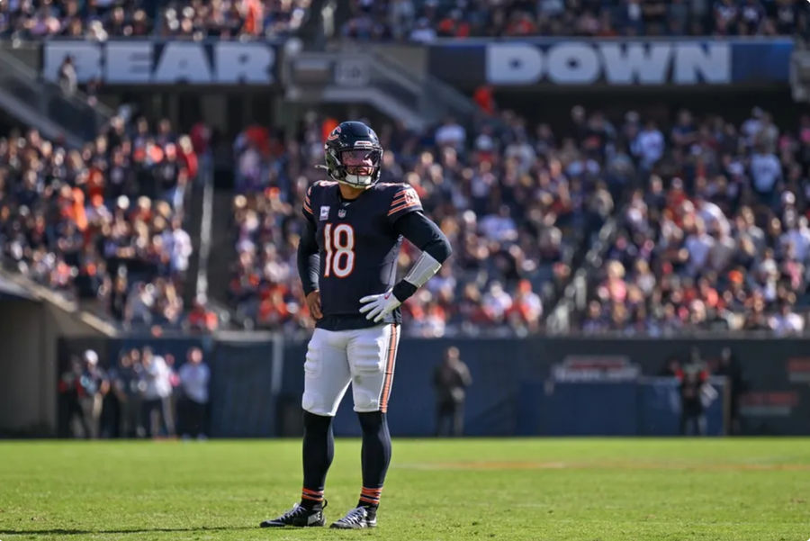 Oct 6, 2024; Chicago, Illinois, USA; Chicago Bears quarterback Caleb Williams (18) looks on against the Carolina Panthers during the fourth quarter at Soldier Field. Mandatory Credit: Daniel Bartel-Imagn Images