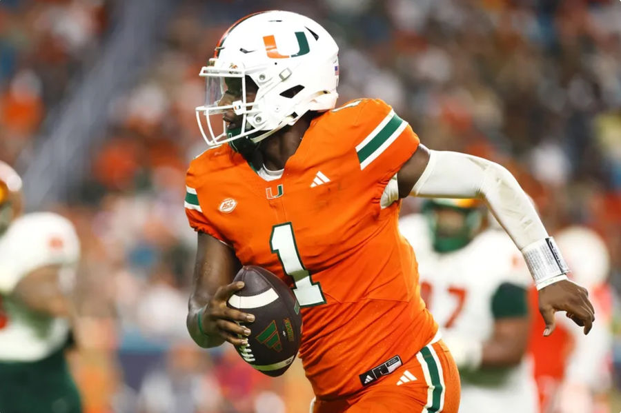 Sep 7, 2024; Miami Gardens, Florida, USA; Miami Hurricanes quarterback Cam Ward (1) runs with the football for a touchdown against the Florida A&amp;M Rattlers during the third quarter at Hard Rock Stadium. Mandatory Credit: Sam Navarro-Imagn Images