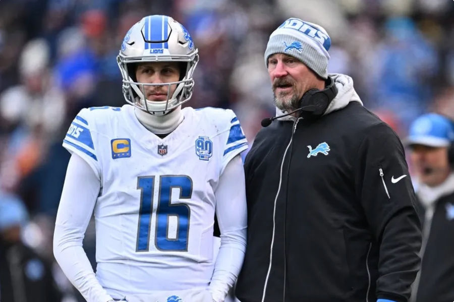 Dec 10, 2023; Chicago, Illinois, USA; Detroit Lions head coach Dan Campbell talks with quarterback Jared Goff (16) in the first half against the Chicago Bears at Soldier Field. credits: Jamie Sabau-USA TODAY Sports