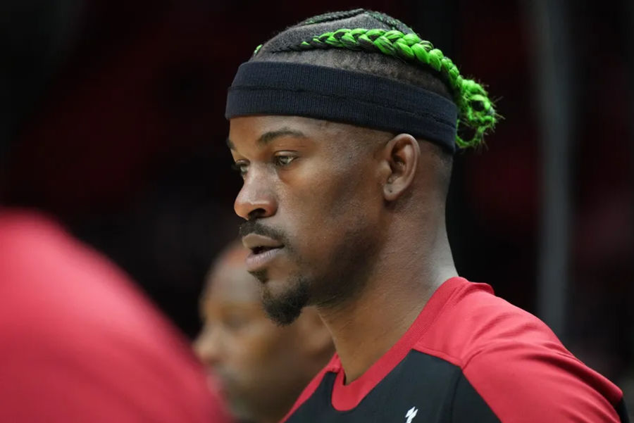 Jan 2, 2025; Miami, Florida, USA; Miami Heat forward Jimmy Butler (22) warms-up before the game against the Indiana Pacers at Kaseya Center. Mandatory Credit: Jim Rassol-Imagn Images