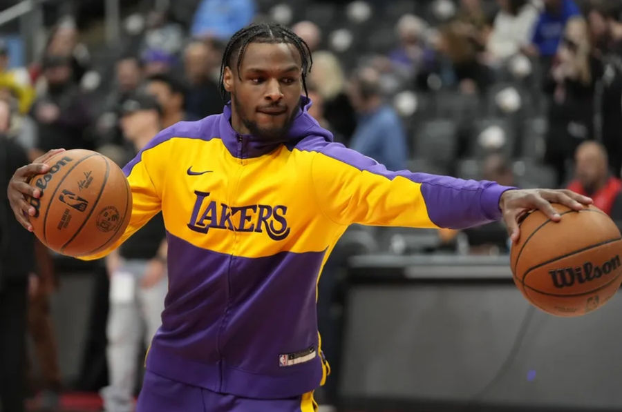 Nov 1, 2024; Toronto, Ontario, CAN; Los Angeles Lakers guard Bronny James (9) during warm-up before a game against the Toronto Raptors at Scotiabank Arena. Mandatory Credit: John E. Sokolowski-Imagn Images