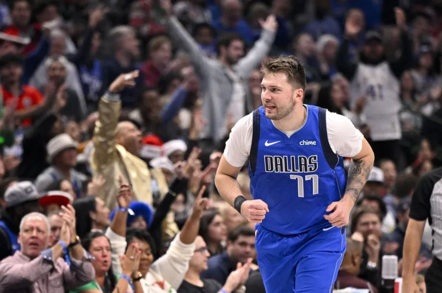 Dec 25, 2024; Dallas, Texas, USA; Dallas Mavericks guard Luka Doncic (77) celebrates after making a basket against the Minnesota Timberwolves during the first quarter at the American Airlines Center. Mandatory Credit: Jerome Miron-Imagn Images