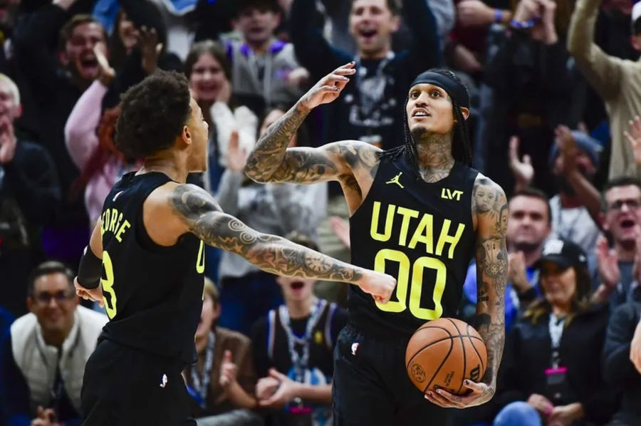 Jan 1, 2024; Salt Lake City, Utah, USA; Utah Jazz guard Jordan Clarkson (00) reacts after recovering a rebound for a record breaking triple-double against the Dallas Mavericks during the second half at the Delta Center. credits: Christopher Creveling-USA TODAY Sports