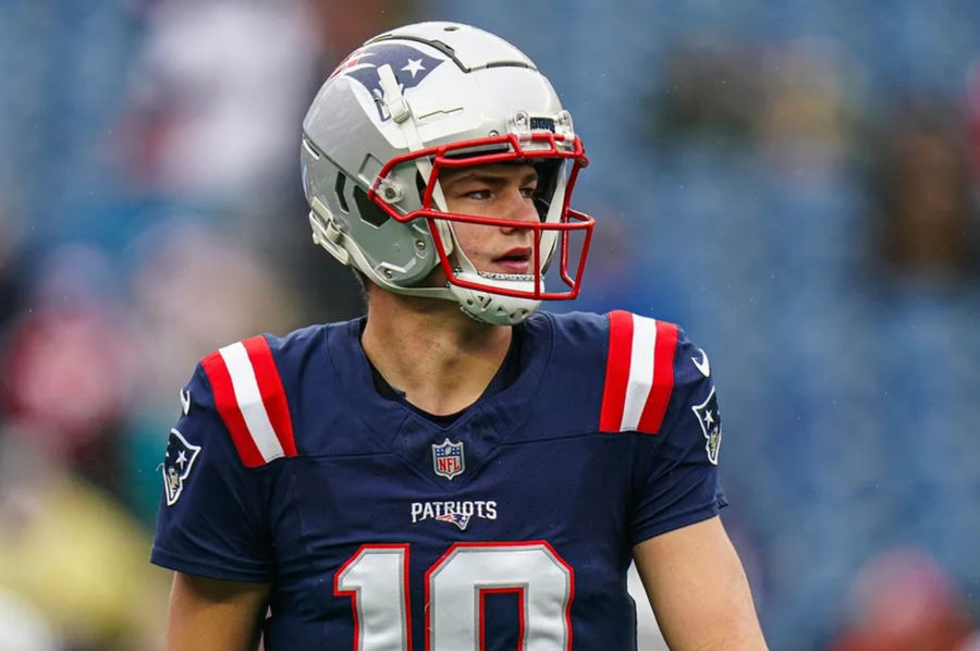 Dec 28, 2024; Foxborough, Massachusetts, USA; New England Patriots quarterback Drake Maye (10) warms up before the start of the game against the Los Angeles Chargers at Gillette Stadium. Mandatory Credit: David Butler II-Imagn Images