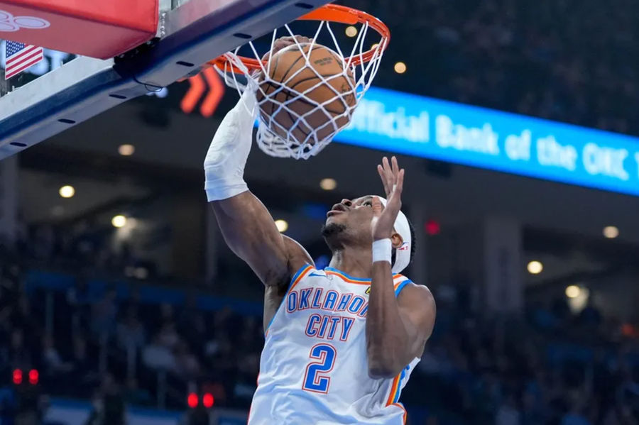 Oklahoma City guard Shai Gilgeous-Alexander (2) dunks the ball in the first quarter during an NAB game between Oklahoma City and Milwaukee at the Paycom Center in Oklahoma City on Monday, Feb. 3, 2025.PHOTO USA TODAY SPORTS IMAGES