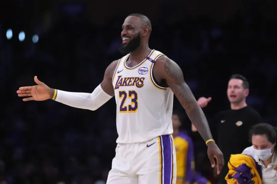 Dec 15, 2024; Los Angeles, California, USA; Los Angeles Lakers forward LeBron James (23) reacts in the first half against the Memphis Grizzlies at Crypto.com Arena. Mandatory Credit: Kirby Lee-Imagn Images