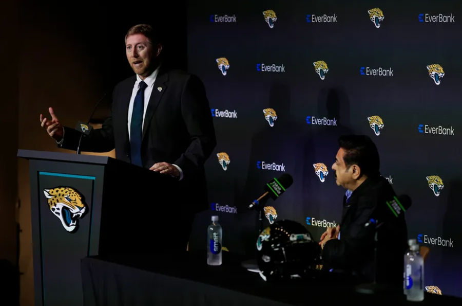 New Jacksonville Jaguars head coach Liam Coen speaks as Jaguars owner Shad Khan looks on during a press conference Monday, Jan. 27, 2025 at the Miller Electric Center in Jacksonville, Fla. [Corey Perrine/Florida Times-Union]