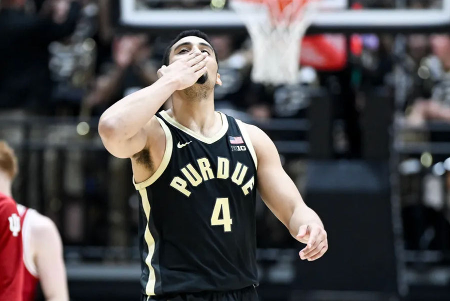 Jan 31, 2025; West Lafayette, Indiana, USA; Purdue Boilermakers forward Trey Kaufman-Renn (4) celebrates after a play during the second half against the Indiana Hoosiers at Mackey Arena. Mandatory Credit: Robert Goddin-Imagn Images