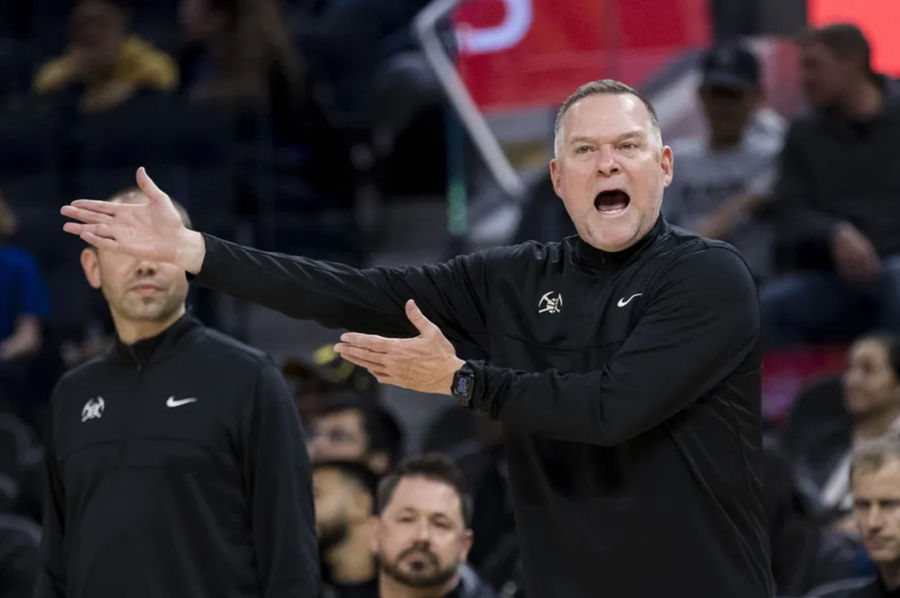 Oct 14, 2022; San Francisco, California, USA; Denver Nuggets head coach Mike Malone reacts after he is called for a foul during the first half of the game against the Golden State Warriors at Chase Center. Mandatory Credit: John Hefti-Imagn Images