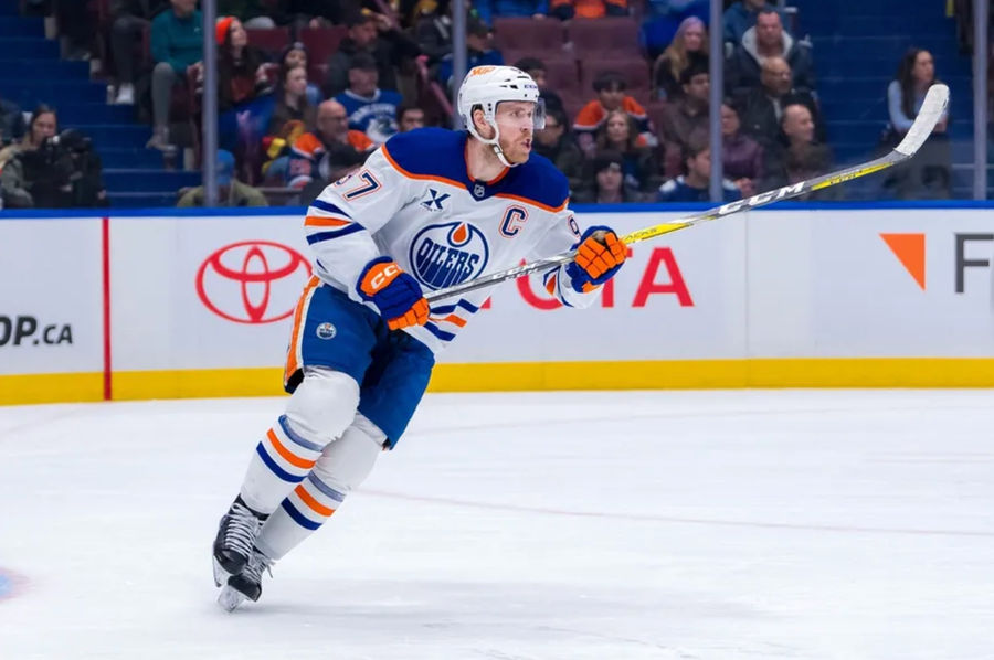 Jan 18, 2025; Vancouver, British Columbia, CAN; Edmonton Oilers forward Connor McDavid (97) skates against the Vancouver Canucks in the second period at Rogers Arena. Mandatory Credit: Bob Frid-Imagn Images