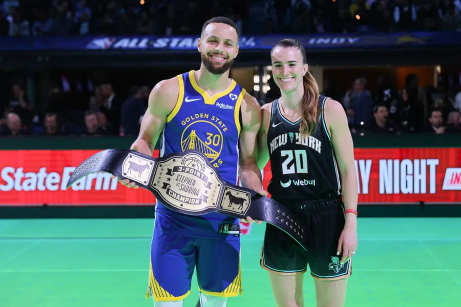 Stephen Curry of the Golden State Warriors and Sabrina Ionescu of the New York Liberty pose for a photo after their 3-point challenge during the State Farm All-Star Saturday Night at Lucas Oil Stadium. source: Getty Images