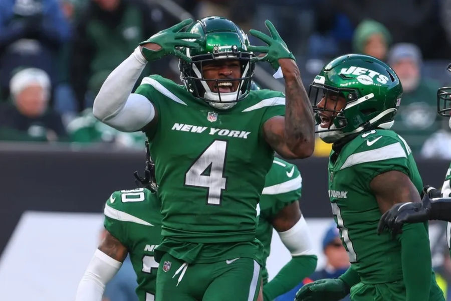 Dec 18, 2022; East Rutherford, New Jersey, USA; New York Jets cornerback D.J. Reed (4) celebrates a defensive stop against the Detroit Lions during the second half at MetLife Stadium. credits: Ed Mulholland-USA TODAY Sports