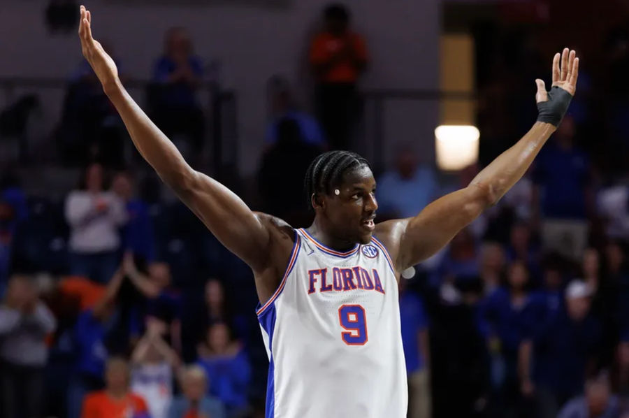 Feb 15, 2025; Gainesville, Florida, USA; Florida Gators center Rueben Chinyelu (9) gestures toward the crowd against the South Carolina Gamecocks during the second half at Exactech Arena at the Stephen C. O'Connell Center. Mandatory Credit: Matt Pendleton-Imagn Images