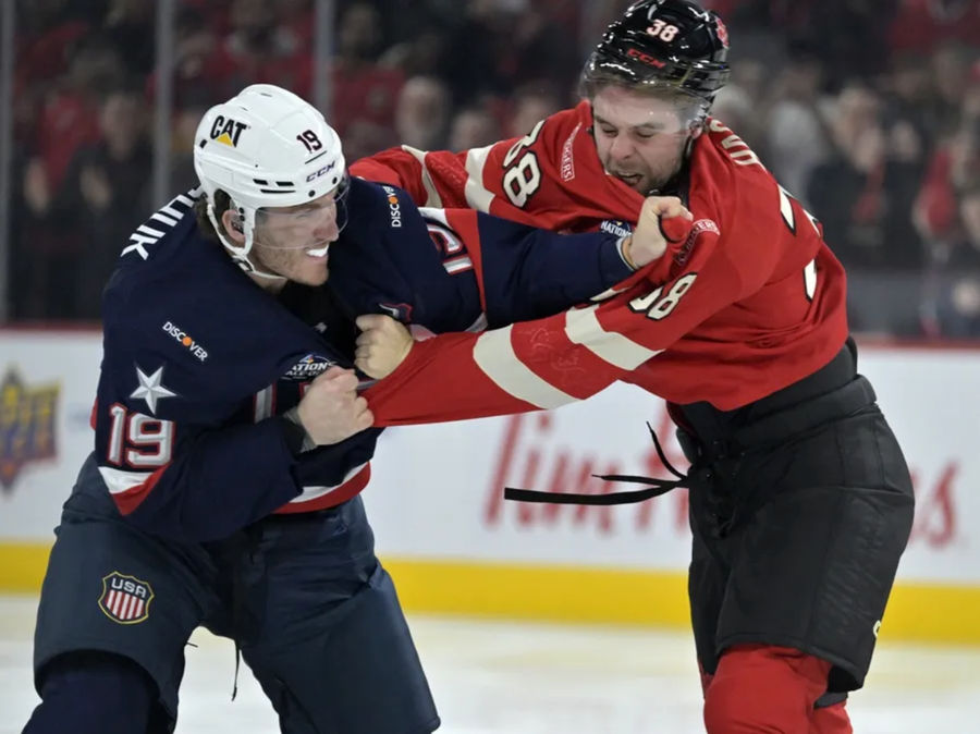 Feb 15, 2025; Montreal, Quebec, CAN; [Imagn Images direct customers only] Team United States forward Matthew Tkachuk (19) and Team Canada forward brandon Hagel (38) fight in the first period during a 4 Nations Face-Off ice hockey game at the Bell Centre. Mandatory Credit: Eric Bolte-Imagn Images