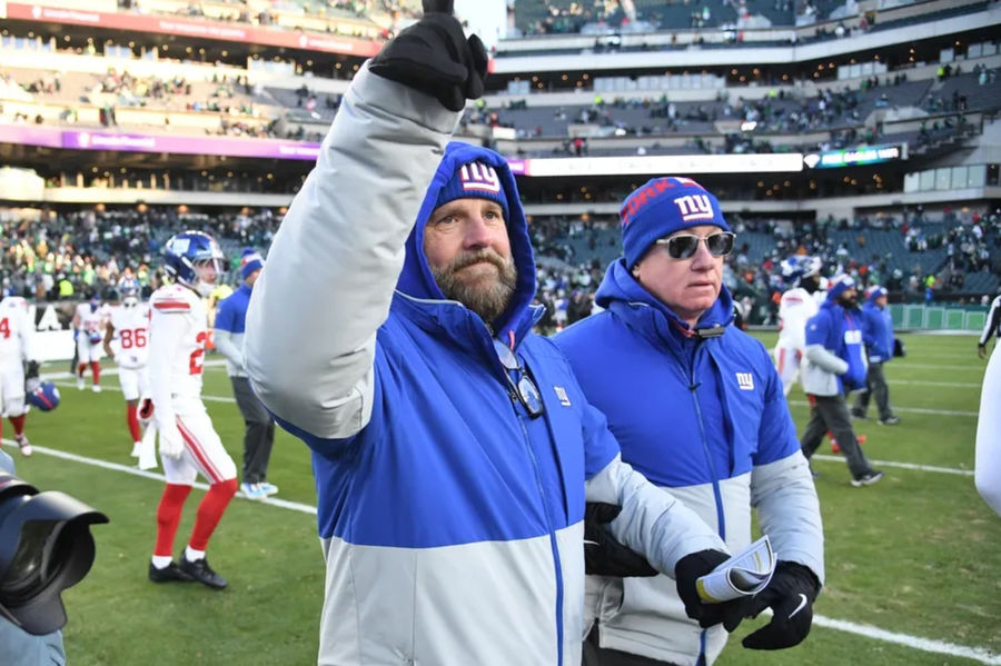 Jan 5, 2025; Philadelphia, Pennsylvania, USA; New York Giants head coach Brian Daboll walks onto the field after loss to Philadelphia Eagles at Lincoln Financial Field. Mandatory Credit: Eric Hartline-Imagn Images