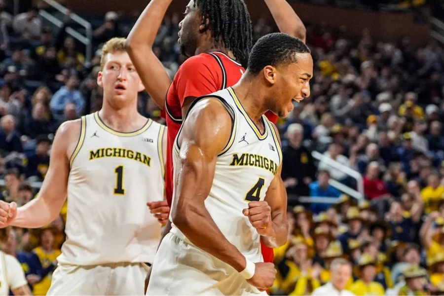 Michigan Wolverines guard Nimari Burnett (4) celebrates the foul leading to a three-point play during the second half at Crisler Center in Ann Arbor on Thursday, Feb. 27, 2025. PHOTO USA TODAY SPORTS IMAGES