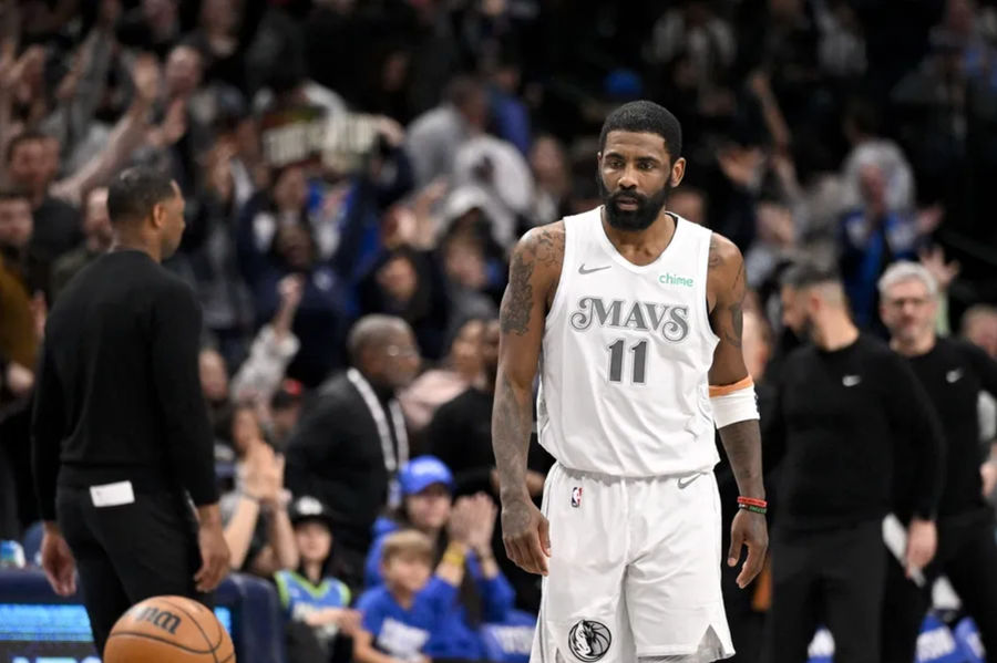 Feb 21, 2025; Dallas, Texas, USA; Dallas Mavericks guard Kyrie Irving (11) looks on after he makes a three point shot against the New Orleans Pelicans during the second half at the American Airlines Center. Mandatory Credit: Jerome Miron-Imagn Images