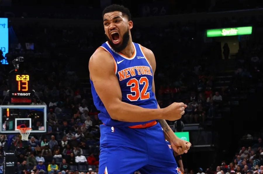 Feb 28, 2025; Memphis, Tennessee, USA; New York Knicks center Karl-Anthony Towns (32) reacts during the second quarter against the Memphis Grizzlies at FedExForum. Mandatory Credit: Petre Thomas-Imagn Images