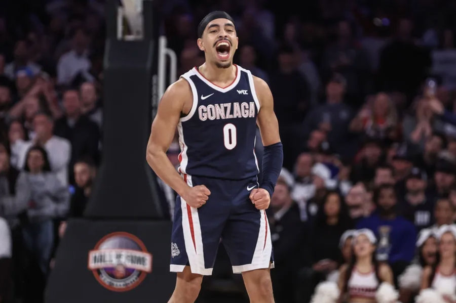 Dec 14, 2024; New York, New York, USA; Gonzaga Bulldogs guard Ryan Nembhard (0) celebrates after a timeout is called by the Connecticut Huskies in the second half at Madison Square Garden. Mandatory Credit: Wendell Cruz-Imagn Images