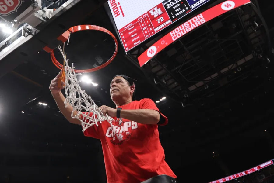 Mar 15, 2025; Kansas City, MO, USA; Houston Cougars head coach Kelvin Sampson cuts the net after defeating the Arizona Wildcats in the Big 12 Conference Tournament Championship game at T-Mobile Center. Mandatory Credit: William Purnell-Imagn Images