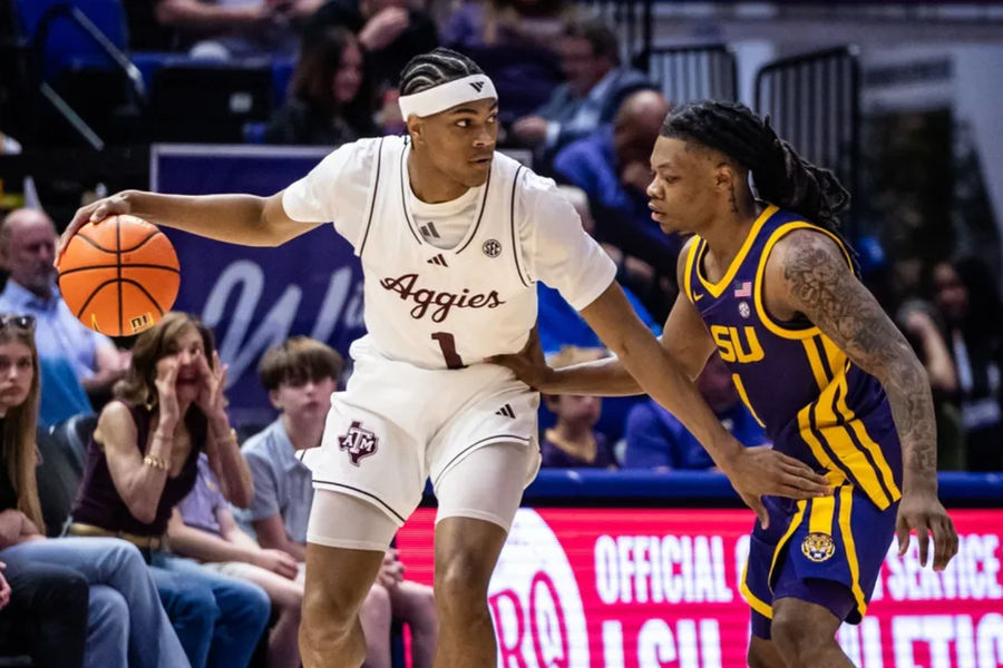 Mar 8, 2025; Baton Rouge, Louisiana, USA; Texas A&amp;M Aggies guard Zhuric Phelps (1) dribbles against LSU Tigers guard Jordan Sears (1) during the first half at Pete Maravich Assembly Center. Mandatory Credit: Stephen Lew-Imagn Images