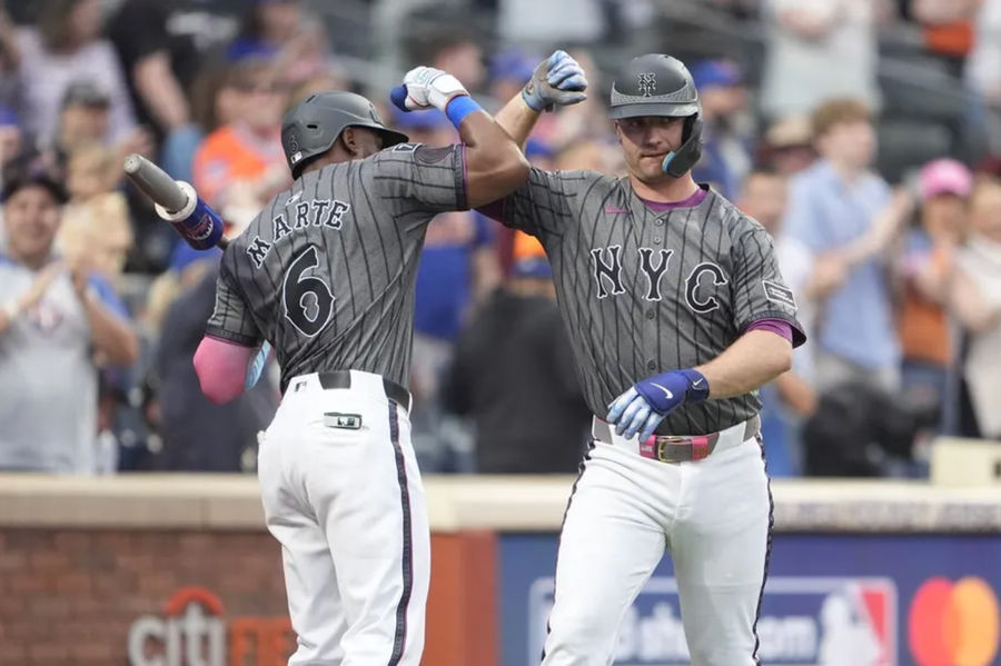 April 19, 2025; New York City, New York, USA; New York Met's congratulated the Hotter Staring Marte (6) named New York Met's First Basiman Pete Alonso (20) during the eighth innings in the city field for hitting a house against St. Louis Cardinals during the eighth innings in the city field. Compulsory Credit: Gregory Fisher-Imagon Picture