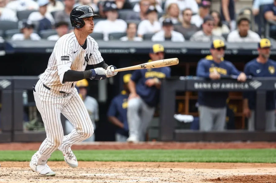 March 29, 2025; Bronx, New York, USA; New York Yankees, field player Cody Bellinger (35), Yankee Stadium Milwaukee Breweers against a sixth shot against a RBI Single hit. Compulsory Credit: Wendell Cruz-Imagn Images