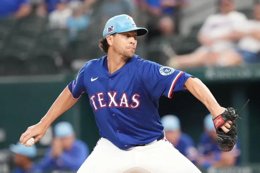 25 March 2025; Arlington, Texas, USA; Texas Rangers offers a step to Kansas City Royals in the third shot in Jacob Degrom (48) and Globe Life Field. Compulsory Credit: Jim Cowssert-Imagn Images