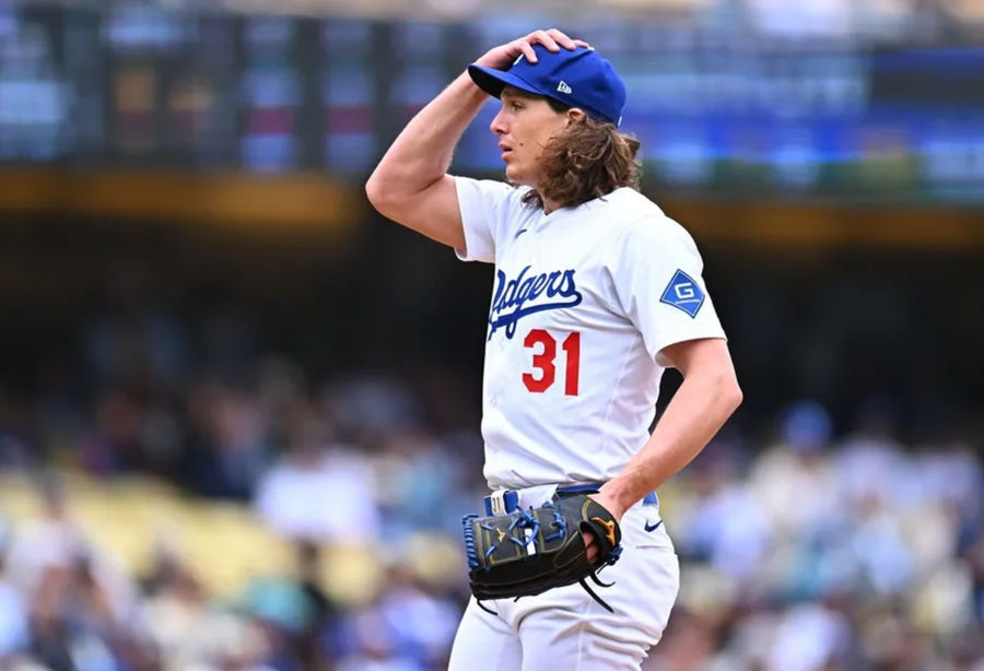 April 27, 2025; Los Angeles, California, USA; Los Angeles Dodgers Jug Tyler Glasnow (31) reacts after a field during the first shot against Pittsburgh Pirates at the Dodger Stadium. Compulsory Credit: Jonathan Hui-Imagn Images