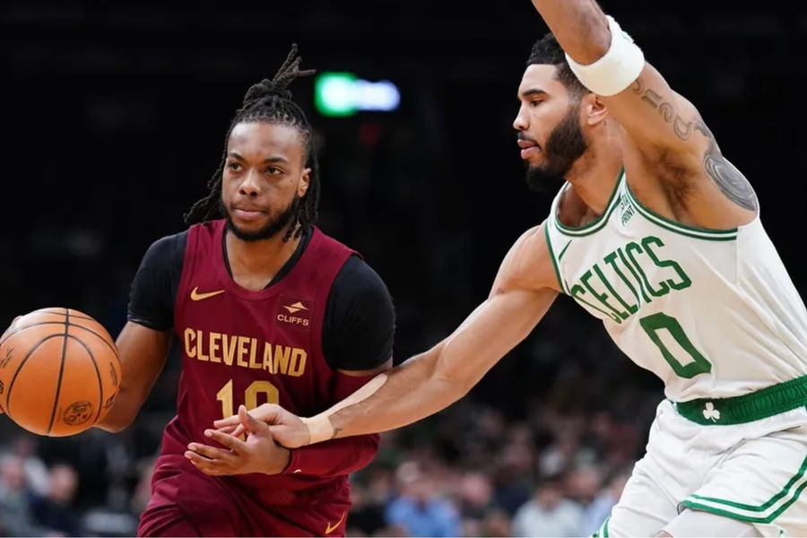 Dec 14, 2023; Boston, Massachusetts, USA; Cleveland Cavaliers guard Darius Garland (10) drives the ball against Boston Celtics forward Jayson Tatum (0) in the first quarter at TD Garden. credits: David Butler II-USA TODAY Sports