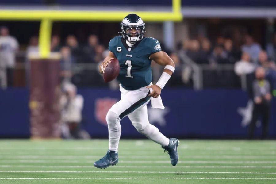 Philadelphia Eagles quarterback Jalen Hurts (1) rolls out in the game against the Dallas Cowboys at AT&amp;T Stadium. Mandatory Credit: Tim Heitman-Imagn Images