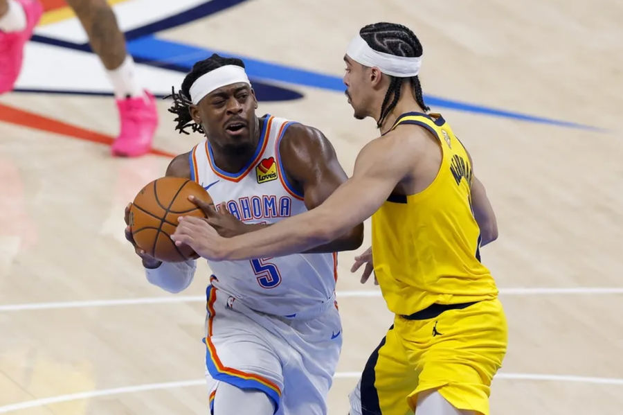 16 June, 2025; Oklahoma City, Oklahoma, USA; The Oklahoma City Thunder Guard Luguintz Dort (5) Drives for the basket of Andrew Nebhard (2) during the second quarter in Sports Five of the 2025 NBA final at Packom Center. Compulsory Credit: Alonjo Adams-Imagon Picture